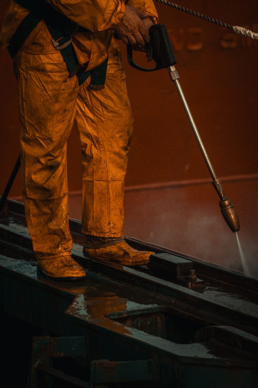 Pressure washing a built-up outdoor surface